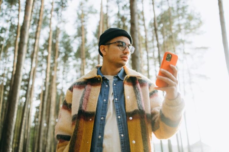 person checking phone signal outdoors
