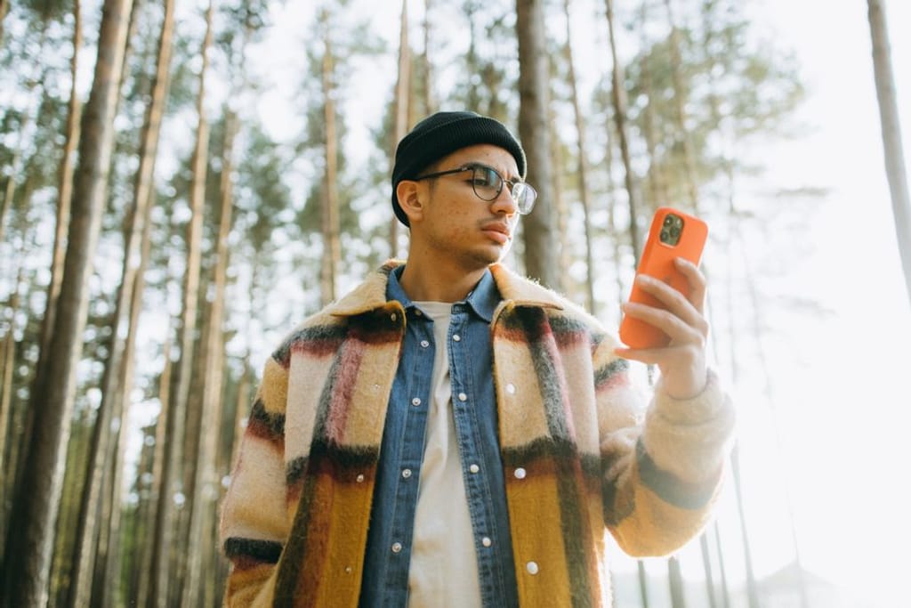 person checking phone signal outdoors